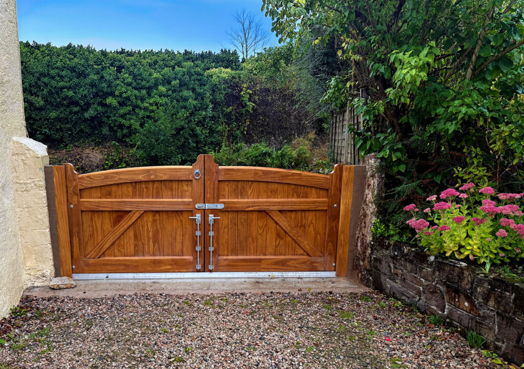 Double Accoya Timber Flood Gate, with silver ironmongery