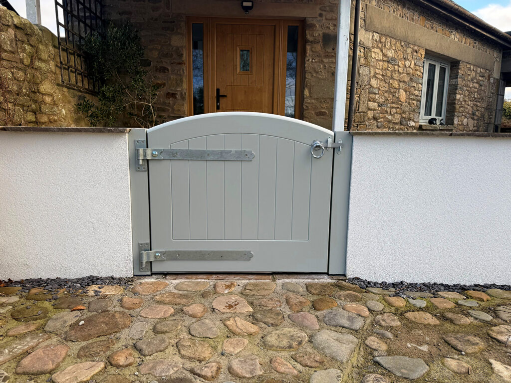 Flood Gate, Accoya timber, Colour Finished in Light Grey. Fitted with Silver ironmongery at a residential Property.