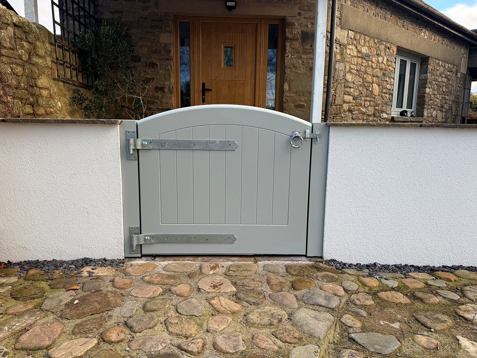 Flood Gate, Accoya timber, Colour Finished in Light Grey. Fitted with Silver ironmongery at a residential Property.