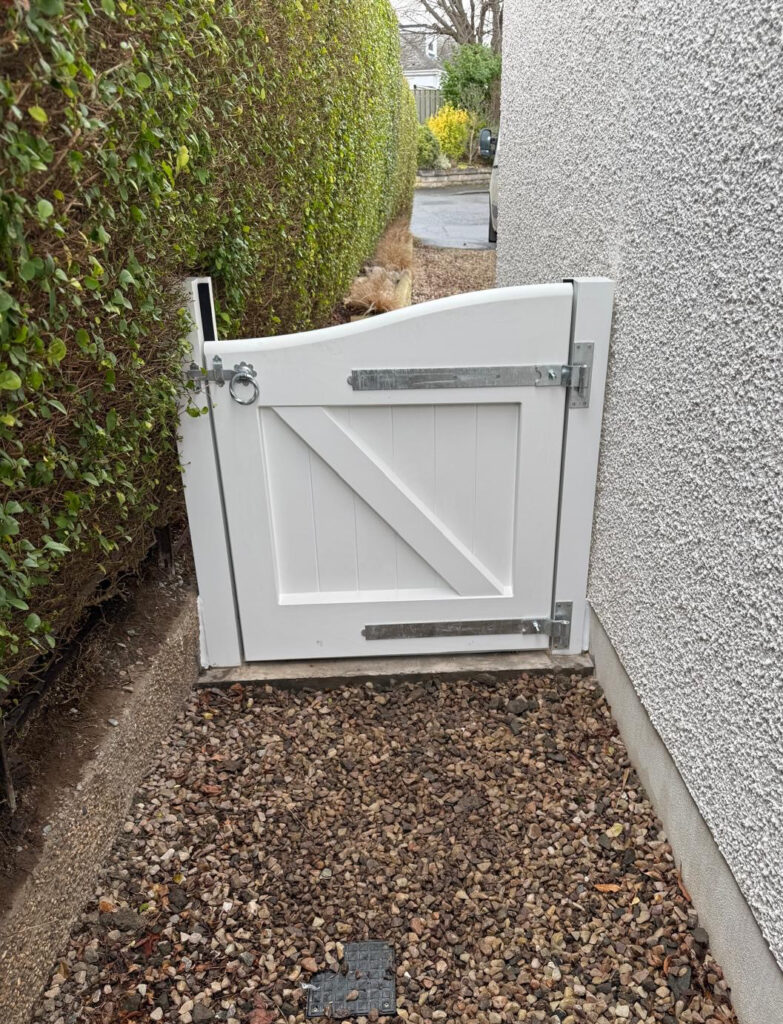 Timber Flood Gate colour finished in white - made using Accoya treated timber.